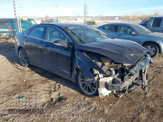 2020 Ford Fusion Hybrid Titanium with VIN 3FA6P0RU9LR141476, listed as a IAAI auction lot 41472921 with 84,433 mi miles. Bid and sale history available at carsss.com. Image 1.