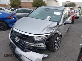 2022 Honda Odyssey EX-L with VIN 5FNRL6H77NB041754, listed as a IAAI auction lot 41791425 with 15,306 mi miles and . Bid and sale history available at DreamBid. Image 6.