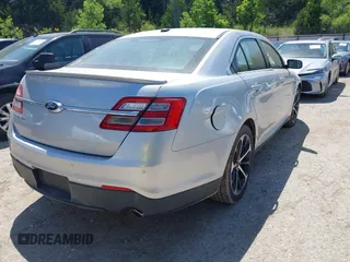 2014 Ford Taurus SEL z VIN 1FAHP2E88EG131304, wystawiony jako IAAI lot #42193759 z przebiegiem 174 465 mil mil oraz . Historia ofert i sprzedaży dostępna na DreamBid. Obrazek 4.