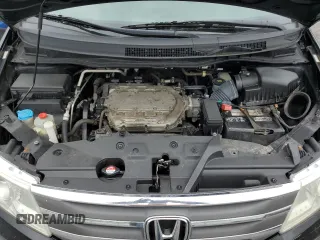 2013 Honda Odyssey EX-L with VIN 5FNRL5H69DB031498, listed as a Copart auction lot 55459745 with 129,773 mi miles and Salvage title. Bid and sale history available at DreamBid. Image 12.
