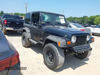 1999 Jeep Wrangler Sport with VIN 1J4FY19S9XP423684, listed as a IAAI auction lot 42614136 with 149,756 mi miles and . Bid and sale history available at DreamBid. Image 1.