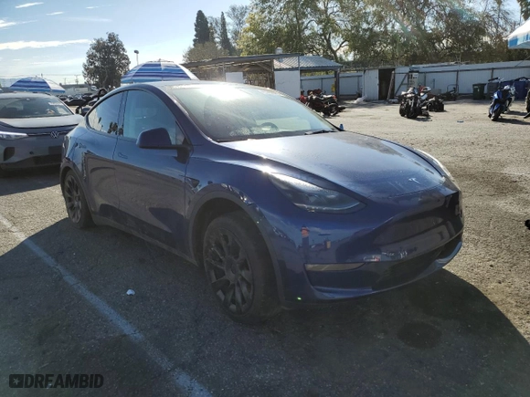 2023 Tesla Model Y Long Range with VIN 7SAYGDEEXPF814469, listed as a Copart auction lot 45982675 with 52,053 mi miles and Salvage Title. Bid and sale history available at carsss.com. Image 4.