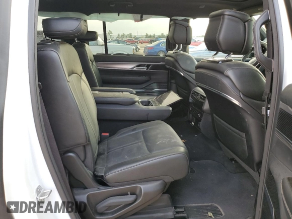 2023 Jeep Grand Wagoneer with VIN 1C4SJVEJ0PS545778, listed as a Copart auction lot 78696014 with 27,771 mi miles and Salvage title. Bid and sale history available at DreamBid. Image 11.