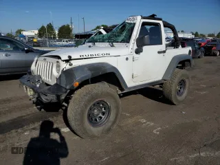 2015 Jeep Wrangler Rubicon with VIN 1C4BJWCG0FL695931, listed as a Copart auction lot 70685724 with 72,740 mi miles and Salvage title. Bid and sale history available at DreamBid. Image 1.