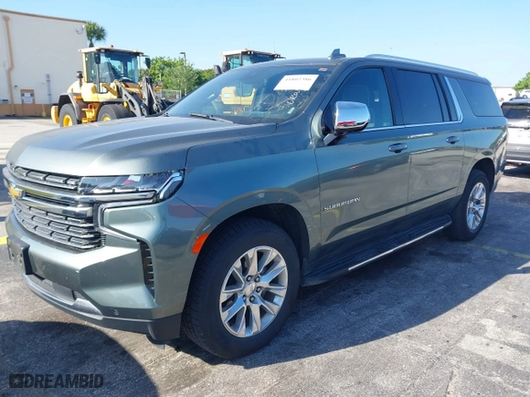 2023 Chevrolet Suburban Premier with VIN 1GNSCFKD4PR378869, listed as a IAAI auction lot 41802386 with 58,569 mi miles. Bid and sale history available at carsss.com. Image 18.
