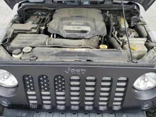 2016 Jeep Wrangler Unlimited Sport z VIN 1C4BJWDG5GL179046, wystawiony jako Copart lot #52989725 z przebiegiem 129 051 mil mil oraz Szkoda całkowita • Salvage title. Historia ofert i sprzedaży dostępna na DreamBid. Obrazek 11.