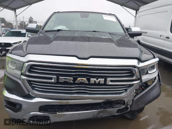 2019 Ram 1500 Laramie with VIN 1C6SRFDTXKN605257, listed as a IAAI auction lot 41562139 with 89,303 mi miles. Bid and sale history available at carsss.com. Image 12.