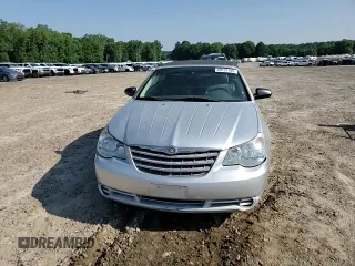 2008 Chrysler Sebring LX z VIN 1C3LC45K28N188707, wystawiony jako Copart lot #60137105 z przebiegiem 245 175 mil mil oraz Szkoda całkowita • Salvage title. Historia ofert i sprzedaży dostępna na DreamBid. Obrazek 13.