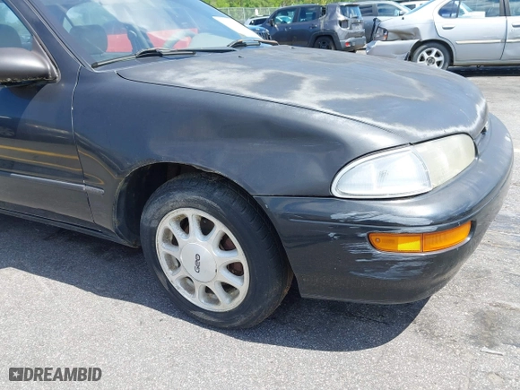 1996 Geo Prizm LSi with VIN 1Y1SK526XTZ026795, listed as a IAAI auction lot 42008701 with 178,017 mi miles. Bid and sale history available at carsss.com. Image 6.