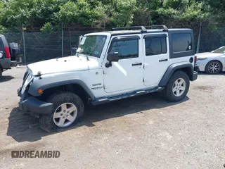 2014 Jeep Wrangler Unlimited Sport z VIN 1C4BJWDG6EL115627, wystawiony jako IAAI lot #42245390 z przebiegiem 121 944 mil mil oraz . Historia ofert i sprzedaży dostępna na DreamBid. Obrazek 2.