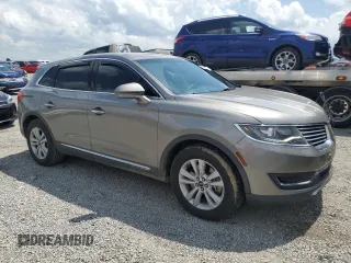 2016 Lincoln MKX Premiere z VIN 2LMTJ6JR9GBL78904, wystawiony jako Copart lot #51188815 z przebiegiem 120 123 mil mil oraz Szkoda całkowita • Salvage title. Historia ofert i sprzedaży dostępna na DreamBid. Obrazek 4.
