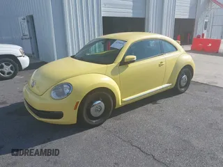 2013 Volkswagen Beetle 2.5L with VIN 3VWHX7AT7DM613197, listed as a IAAI auction lot 41298890 with 130,219 mi miles and . Bid and sale history available at DreamBid. Image 2.