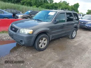 2006 Ford Escape XLT with VIN 1FMCU93106KA37648, listed as a IAAI auction lot 42719362 with 184,321 mi miles and . Bid and sale history available at DreamBid. Image 2.