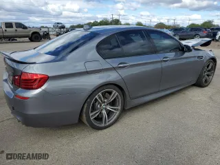 2014 BMW M5 with VIN WBSFV9C58ED097741, listed as a Copart auction lot 53825714 with 81,403 mi miles and Salvage Title. Bid and sale history available at carsss.com. Image 3.