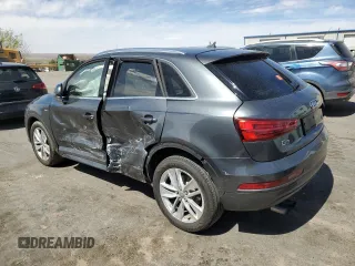 2018 Audi Q3 Premium Plus z VIN WA1JCCFS6JR007404, wystawiony jako Copart lot #45345785 z przebiegiem Nie podano mil oraz Szkoda całkowita • Salvage title. Historia ofert i sprzedaży dostępna na DreamBid. Obrazek 2.