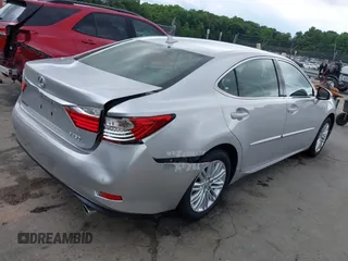2014 Lexus ES 330 z VIN JTHBK1GG4E2098648, wystawiony jako IAAI lot #42254508 z przebiegiem 99 610 mil mil oraz . Historia ofert i sprzedaży dostępna na DreamBid. Obrazek 4.