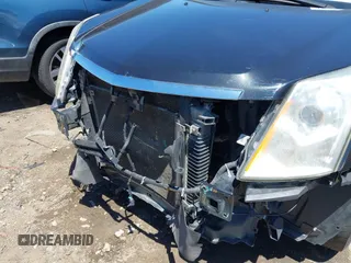 2012 Cadillac SRX Premium Collection with VIN 3GYFNFE30CS613728, listed as a IAAI auction lot 42288990 with 228,432 mi miles and . Bid and sale history available at DreamBid. Image 6.