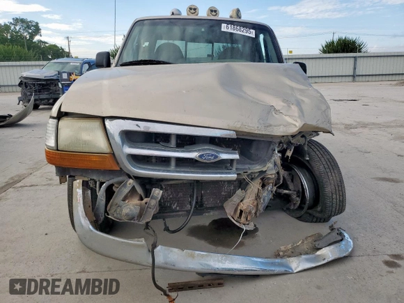 1999 Ford Ranger XL with VIN 1FTYR14VXXPA72216, listed as a Copart auction lot 61868295 with 230,074 mi miles and Salvage title. Bid and sale history available at DreamBid. Image 5.