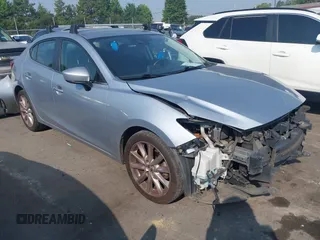 2017 Mazda 3 Touring with VIN 3MZBN1V77HM107588, listed as a IAAI auction lot 42577691 with 197,387 mi miles and . Bid and sale history available at DreamBid. Image 1.