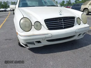 2002 Mercedes-Benz E-Class with VIN WDBJF65J22B432263, listed as a IAAI auction lot 42130545 with 220,852 mi miles. Bid and sale history available at carsss.com. Image 6.