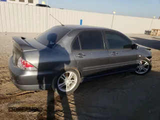 2005 Mitsubishi Lancer with VIN JA3AJ66F25U016375, listed as a Copart auction lot 73584514 with 202,752 mi miles and Clean Title. Bid and sale history available at DreamBid. Image 3.