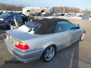 2001 BMW 3 Series 330Ci with VIN WBABS53421JU82591, listed as a IAAI auction lot 41277310 with 99,109 mi miles. Bid and sale history available at carsss.com. Image 4.