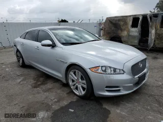 2014 Jaguar XJ with VIN SAJWJ2GD2E8V62696, listed as a Copart auction lot 76620494 with 85,487 mi miles and Salvage Title. Bid and sale history available at carsss.com. Image 4.