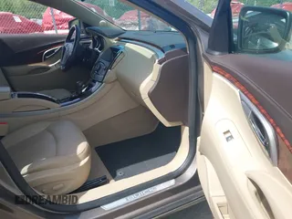 2012 Buick LaCrosse Premium 1 with VIN 1G4GE5E30CF268477, listed as a IAAI auction lot 42360737 with 44,860 mi miles and . Bid and sale history available at DreamBid. Image 5.