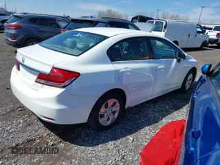 2015 Honda Civic LX with VIN 19XFB2F53FE281911, listed as a IAAI auction lot 42157020 with 201,003 mi miles and . Bid and sale history available at DreamBid. Image 4.