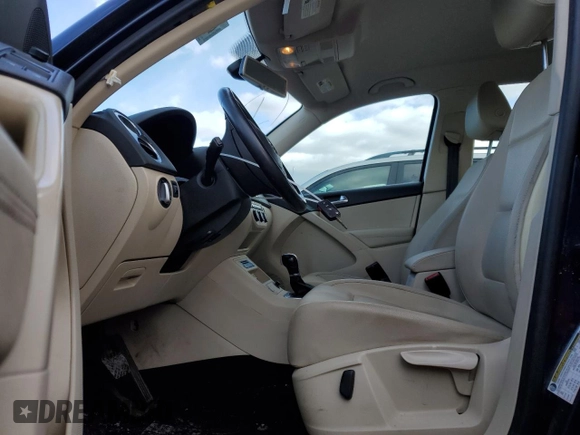 2016 Volkswagen Tiguan S with VIN WVGBV7AX9GW574405, listed as a Copart auction lot 45090275 with 74,974 mi miles and Salvage Title. Bid and sale history available at DreamBid. Image 7.