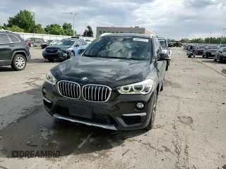 2017 BMW X1 xDrive28i with VIN WBXHT3C32H5F71690, listed as a Copart auction lot 60852375 with 67,475 mi miles and Salvage title. Bid and sale history available at DreamBid. Image 14.