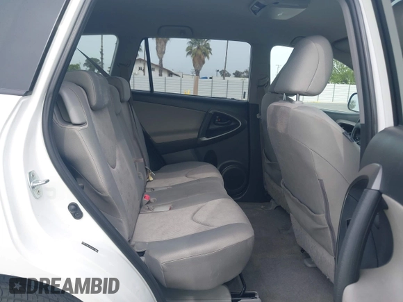 2009 Toyota RAV4 with VIN JTMZF33V49D012527, listed as a IAAI auction lot 42119902 with 160,617 mi miles. Bid and sale history available at carsss.com. Image 8.