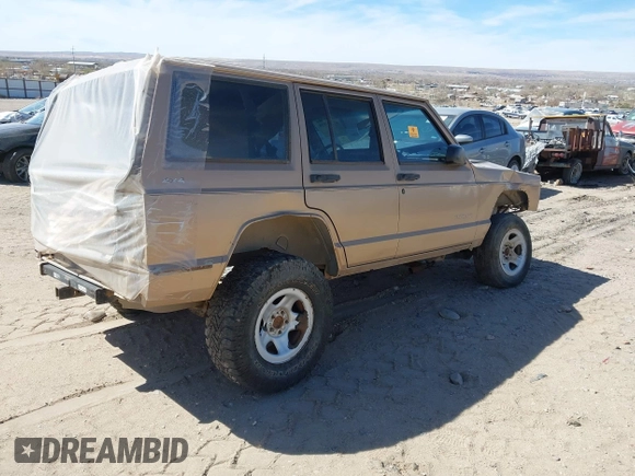 1999 Jeep Cherokee SE with VIN 1J4FF28S5XL520501, listed as a IAAI auction lot 41706800 with Not provided miles and . Bid and sale history available at DreamBid. Image 4.