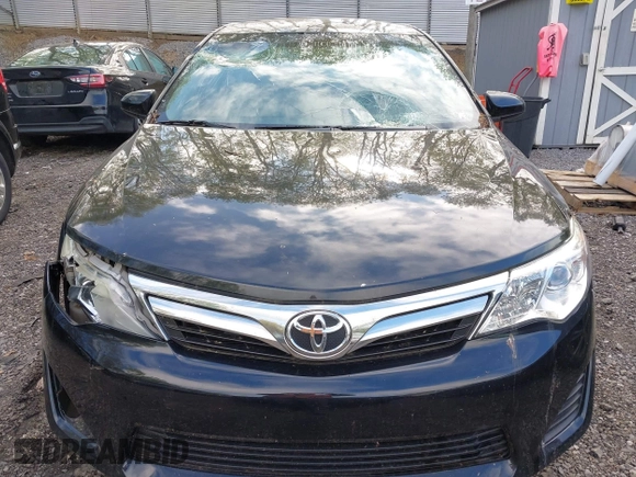2014 Toyota Camry L with VIN 4T4BF1FK7ER395057, listed as a IAAI auction lot 42215441 with 166,247 mi miles and . Bid and sale history available at DreamBid. Image 13.