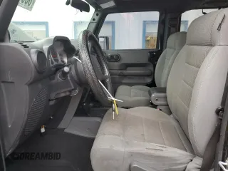 2007 Jeep Wrangler Unlimited Rubicon with VIN 1J8GA69147L113994, listed as a Copart auction lot 86544434 with 100,251 mi miles and Salvage title. Bid and sale history available at DreamBid. Image 7.