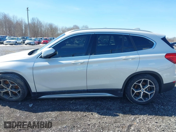 2019 BMW X1 xDrive28i with VIN WBXHT3C58K5N05523, listed as a IAAI auction lot 41752675 with 63,861 mi miles. Bid and sale history available at carsss.com. Image 14.