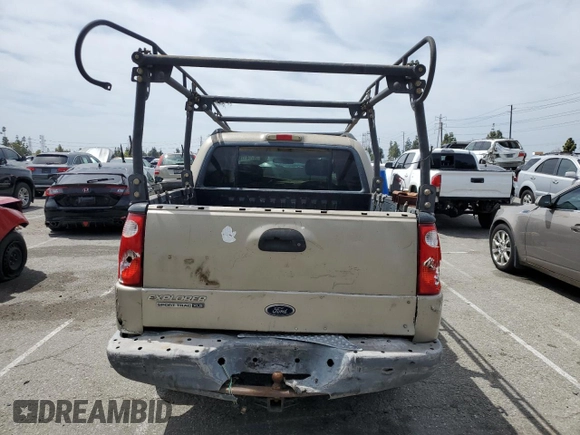 2005 Ford Explorer Sport Trac XLS with VIN 1FMZU67K05UA59602, listed as a Copart auction lot 56756175 with 136,440 mi miles and Salvage title. Bid and sale history available at DreamBid. Image 6.