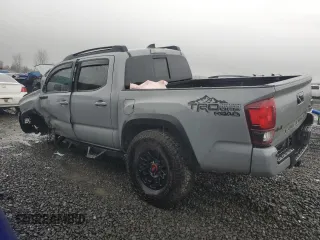 2021 Toyota Tacoma SR with VIN 3TMCZ5AN0MM395357, listed as a Copart auction lot 87086684 with 48,664 mi miles and Salvage title. Bid and sale history available at DreamBid. Image 2.