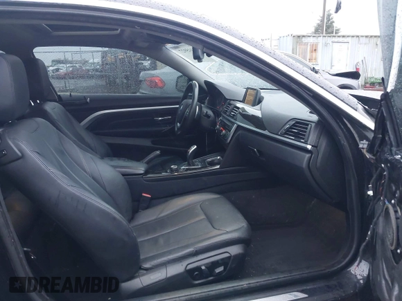 2015 BMW 4 Series 428i xDrive with VIN WBA3N5C56FK197981, listed as a IAAI auction lot 41145927 with 101,944 mi miles and . Bid and sale history available at DreamBid. Image 5.