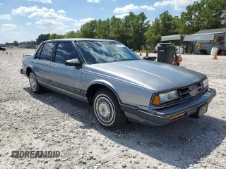 1991 Oldsmobile 88 z VIN 1G3HY54C4MH336805, wystawiony jako Copart lot #73367654 z przebiegiem 168 436 mil mil oraz Szkoda całkowita • Salvage title. Historia ofert i sprzedaży dostępna na DreamBid. Obrazek 4.