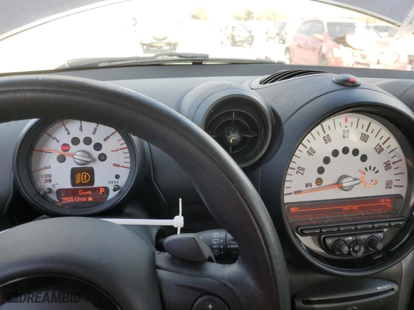 2014 MINI Cooper Countryman S with VIN WMWZC3C5XEWP25131, listed as a Copart auction lot 42112515 with 90,513 mi miles and Salvage Title. Bid and sale history available at carsss.com. Image 9.