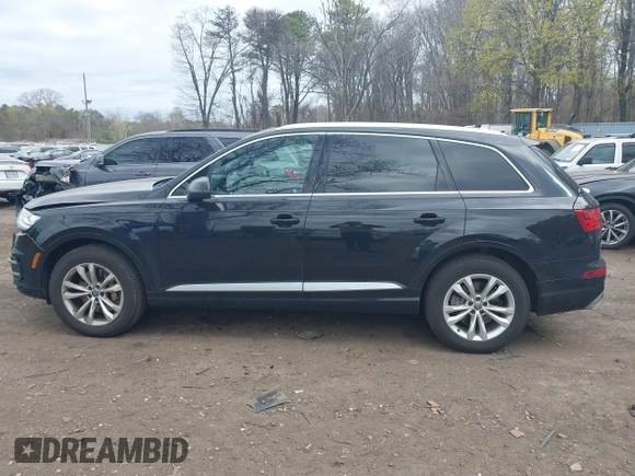 2019 Audi Q7 Premium with VIN WA1AAAF74KD002299, listed as a IAAI auction lot 42066717 with 91,898 mi miles and . Bid and sale history available at DreamBid. Image 14.