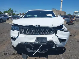 2021 Jeep Grand Cherokee Laredo X with VIN 1C4RJFAG6MC759825, listed as a IAAI auction lot 42281301 with 47,417 mi miles and . Bid and sale history available at DreamBid. Image 12.