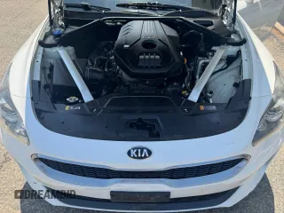 2018 Kia Stinger with VIN KNAE15LA7J6031245, listed as a Copart auction lot 55879285 with 144,020 mi miles and Clean Title. Bid and sale history available at carsss.com. Image 7.