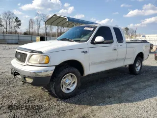 2000 Ford F-150 XL with VIN 1FTRX18L1YNB97492, listed as a Copart auction lot 48732055 with 315,898 mi miles and Salvage Title. Bid and sale history available at carsss.com. Image 1.