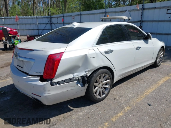 2015 Cadillac CTS Luxury AWD with VIN 1G6AX5SX5F0103725, listed as a IAAI auction lot 42226485 with 112,437 mi miles and . Bid and sale history available at DreamBid. Image 4.