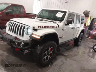 2022 Jeep Wrangler Unlimited Rubicon z VIN 1C4HJXFG7NW106446, wystawiony jako IAAI lot #41405202 z przebiegiem 39 755 mil mil oraz . Historia ofert i sprzedaży dostępna na DreamBid. Obrazek 18.