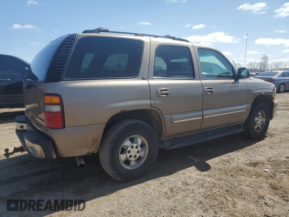 2003 Chevrolet Tahoe LT z VIN 1GNEK13Z43J136234, wystawiony jako Copart lot #51245445 z przebiegiem 227 769 mil mil oraz Czysty tytuł • Clean title. Historia ofert i sprzedaży dostępna na DreamBid. Obrazek 3.