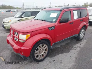 2011 Dodge Nitro Heat with VIN 1D4PT4GK0BW604140, listed as a IAAI auction lot 41208317 with 154,895 mi miles and . Bid and sale history available at DreamBid. Image 2.