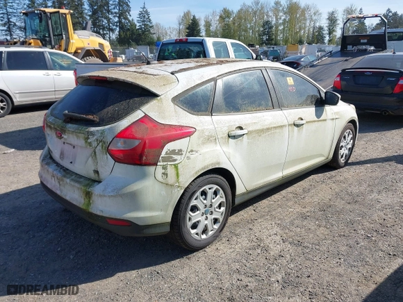2012 Ford Focus SE with VIN 1FAHP3K23CL251716, listed as a IAAI auction lot 42036099 with 119,600 mi miles. Bid and sale history available at carsss.com. Image 4.
